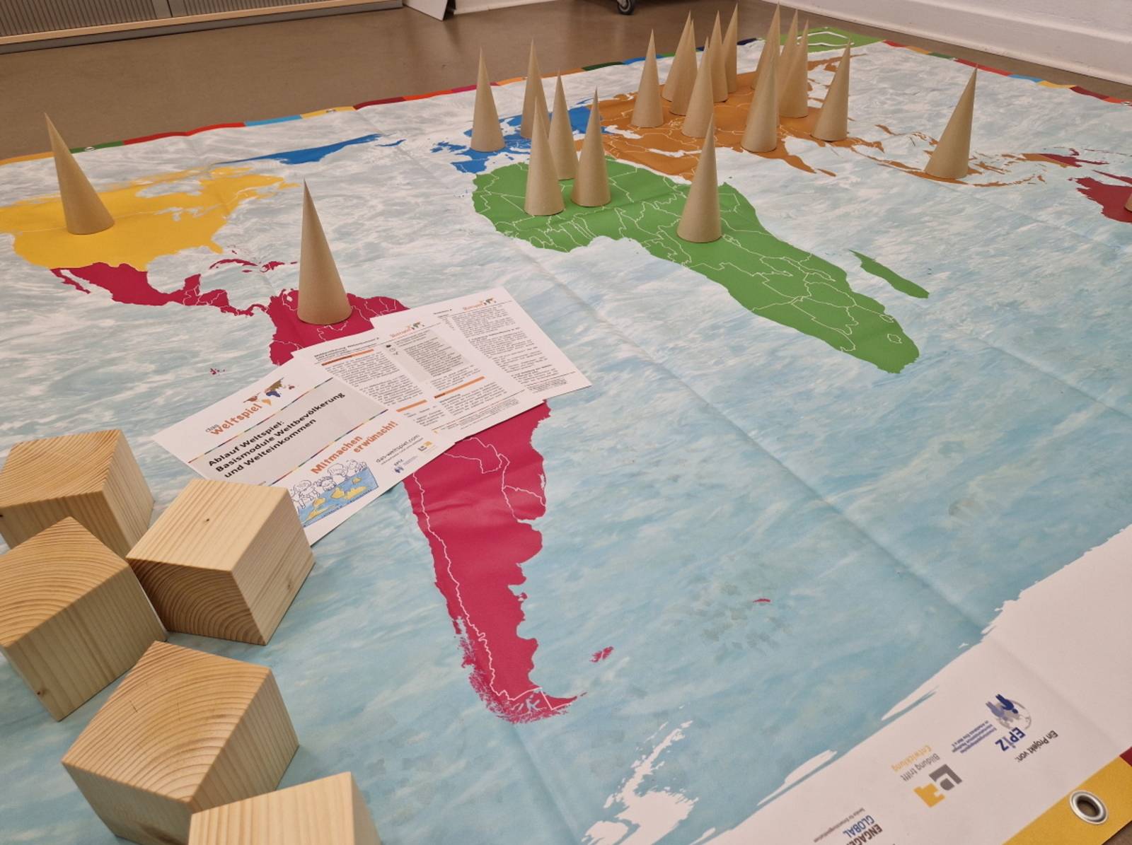 Mit dem Weltspiel ungleiche Verteilungen sichtbar machen