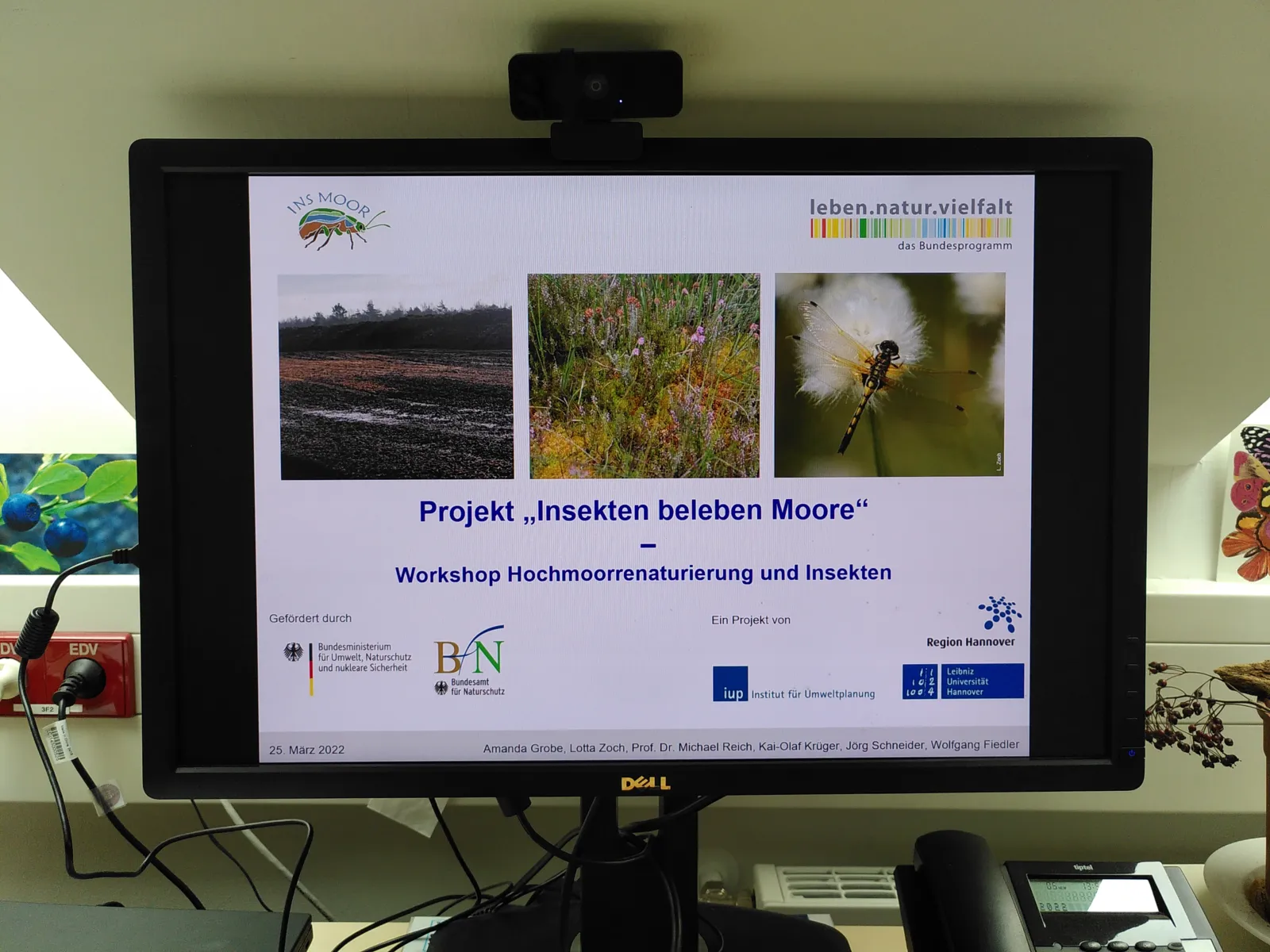 Fotografie eines Monitors mit der Pr&auml;sentation
