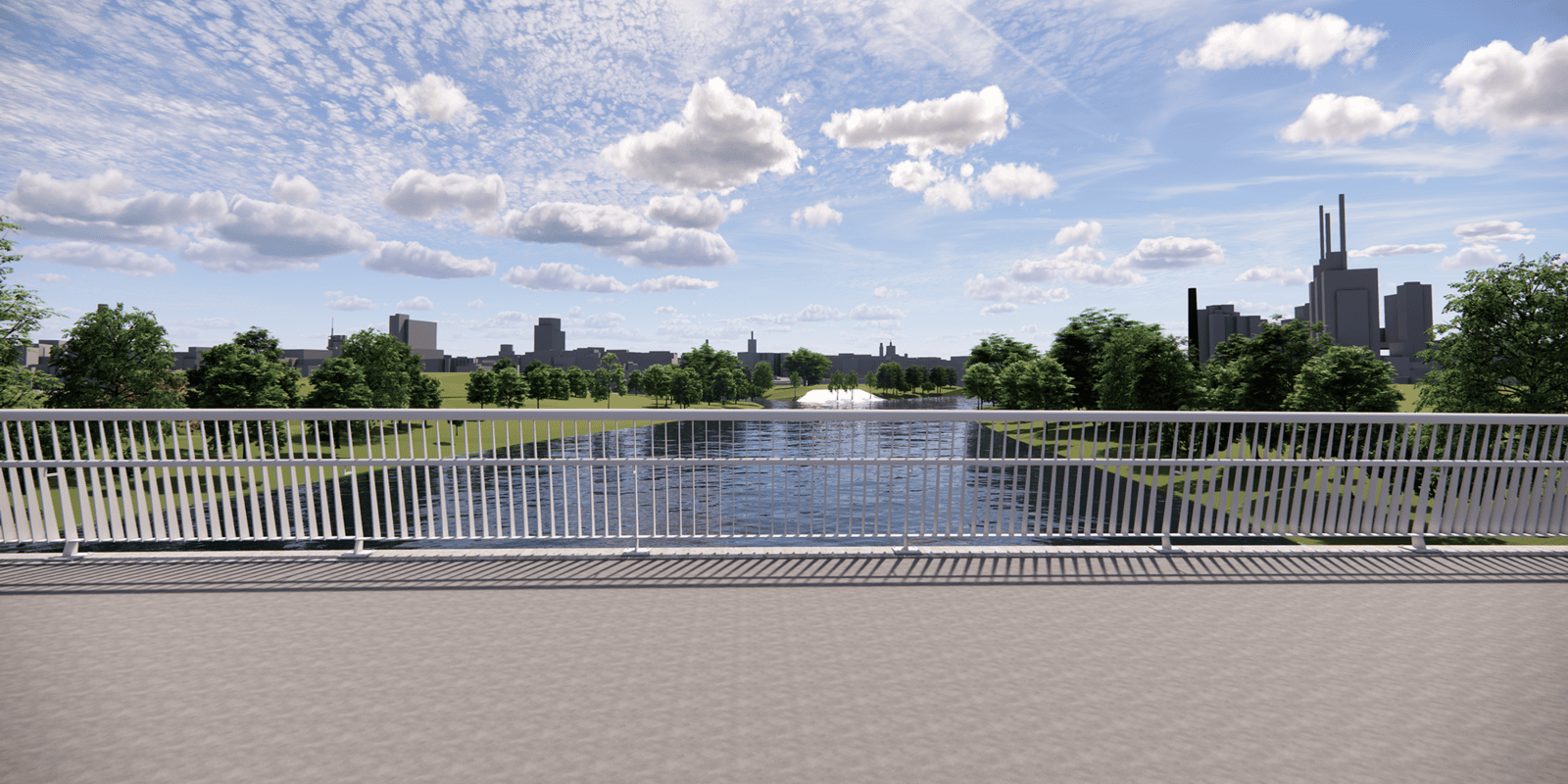 Blick von einer Br&uuml;cke mit Asphaltboden und Gel&auml;nder auf einen Fluss, rechts und links daneben Gr&uuml;nfl&auml;che mit B&auml;umen, weiter hinten Geb&auml;ude.