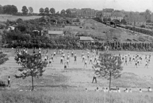 “Exercises at the 1939 sports festival”. A view from the girls’ building over the sport grounds towards Harenberger Strasse (today Heisterbergallee)