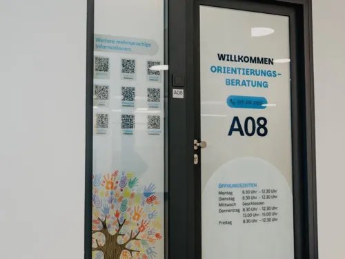 Tür, auf der steht: Orientierungsberatungsstelle