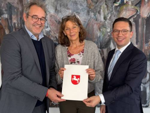 Zwei Männer und eine Frau