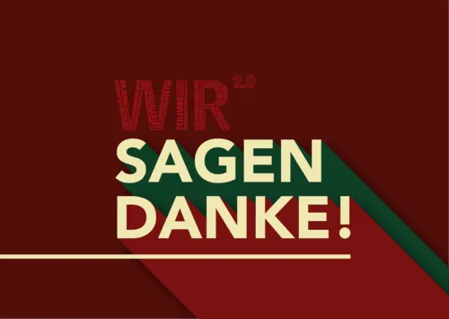 Eine Postkarte in den Farben Rot, Weiß und Grün mit der Aufschrift "WIR 2.0 sagen Danke!