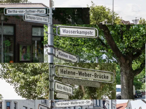 Auf dem Bild sind mehrere Straßenschilder zu sehen.