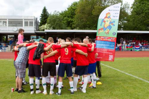 Fußballer im Spielerkreis