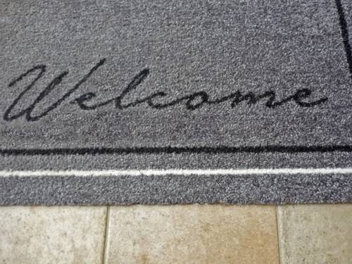 Eine Fußmatte mit dem Schriftzug "Welcome"