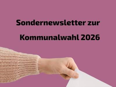 Foto von einer Hand, die einen Brief einwirft.