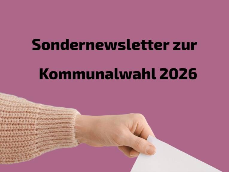 Foto von einer Hand, die einen Brief einwirft.