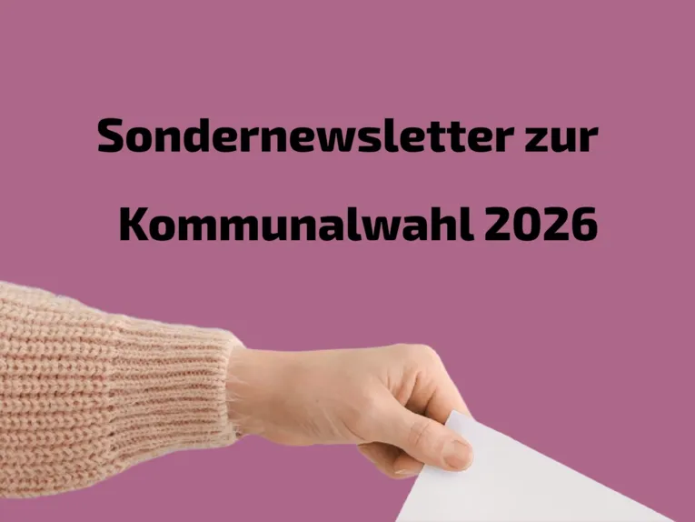 Foto von einer Hand, die einen Brief einwirft.