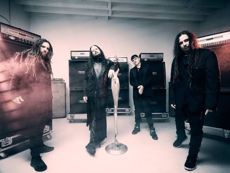 Die vier männlichen Mitglieder der Band Korn.