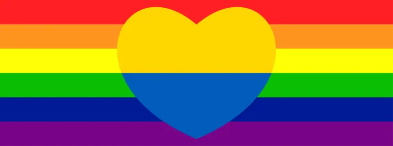Die Regenbogenflagge und ein Herz in den ukrainischen Farben
