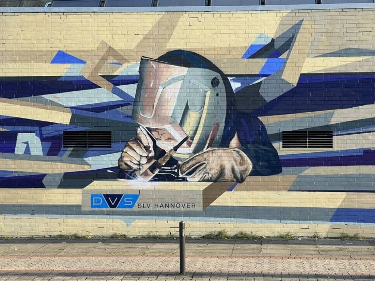 Schweißer am Lindener Hafen, Künstler:IZ-1 (Jascha Müller & Artie Ilsemann)