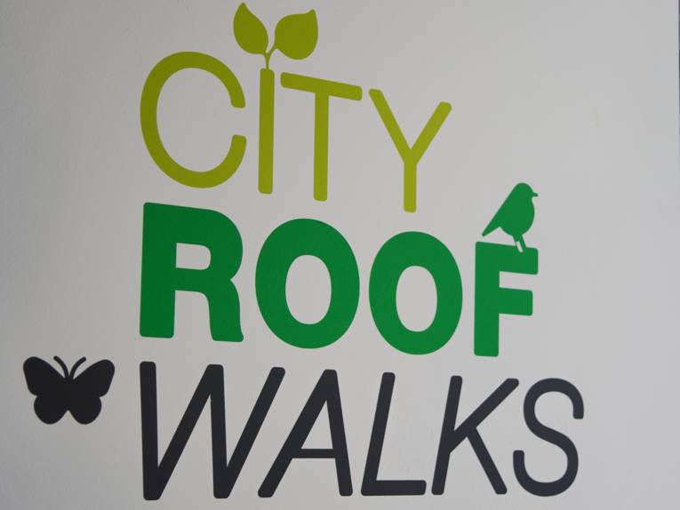 Ein Logo, in dem "City Roof Walk" steht.
