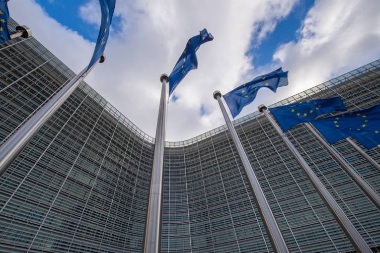 The Berlaymont Building, headquarters of the EC, with European Flags