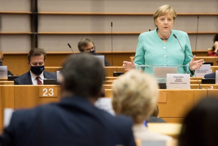 Ursula von der Leyen, (from behind), and Angela Merkel