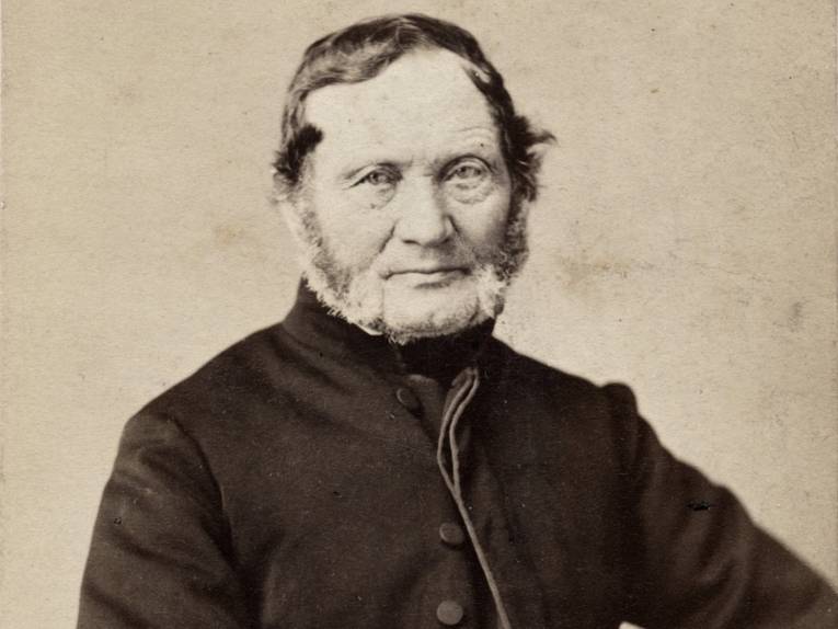 Historische Fotoaufnahme von Hermann Wilhelm Bödeker mit grauem Backenbart