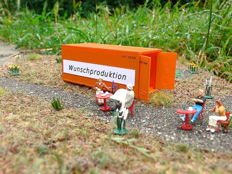 Eine Miniaturdarstellung des Wunschproduktion-Containers