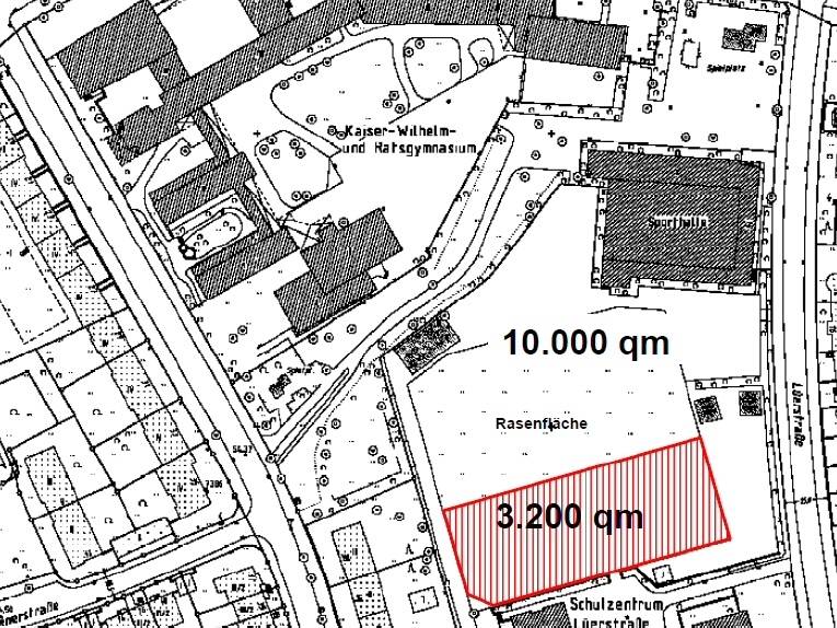 Schwarz-weißer Stadtplan des Schulgeländes Kaiser-Wilhelm- und Ratsgymnasium mit rot eingezeichneter Bebauungsfläche der geplanten Kita Lüerstraße