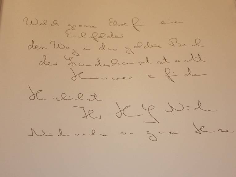 Eine Buchseite mit einer Inschrift. 