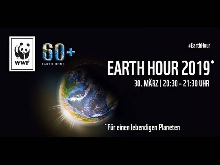 Ankündigung der Earth Hour mit einer halb beleuchteten Weltkugel.