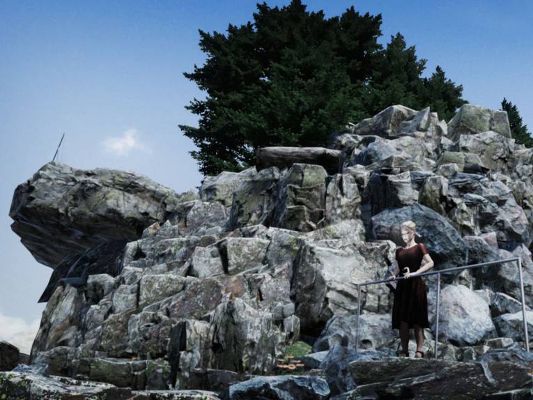 Frau auf einem Aussichtspunkt an einem Felsen