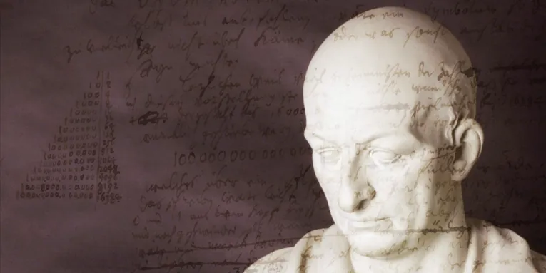 Eine Büste und Schrift.