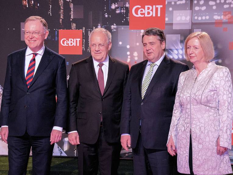 Drei Männer und eine Frau