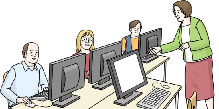 Personen lernen etwas am Computer.
