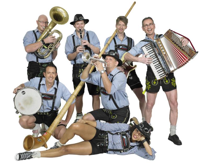 Sechs Männer und eine Frau mit Instrumenten. 